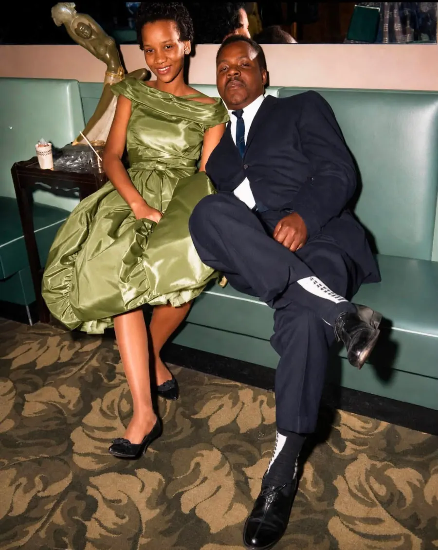 Restored photo of a couple on a date night, with damage repaired and color corrected