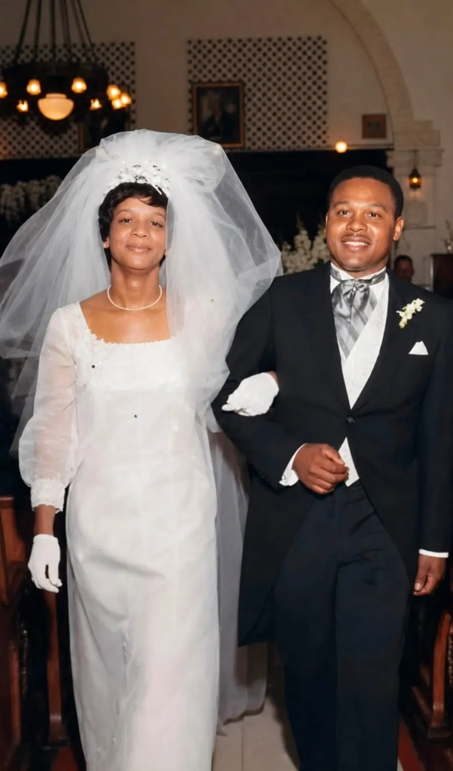 Restored vintage wedding photo of a bride and groom with stains and fading removed